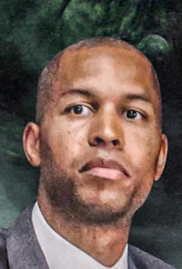 a portrait of a man in a suit and tie